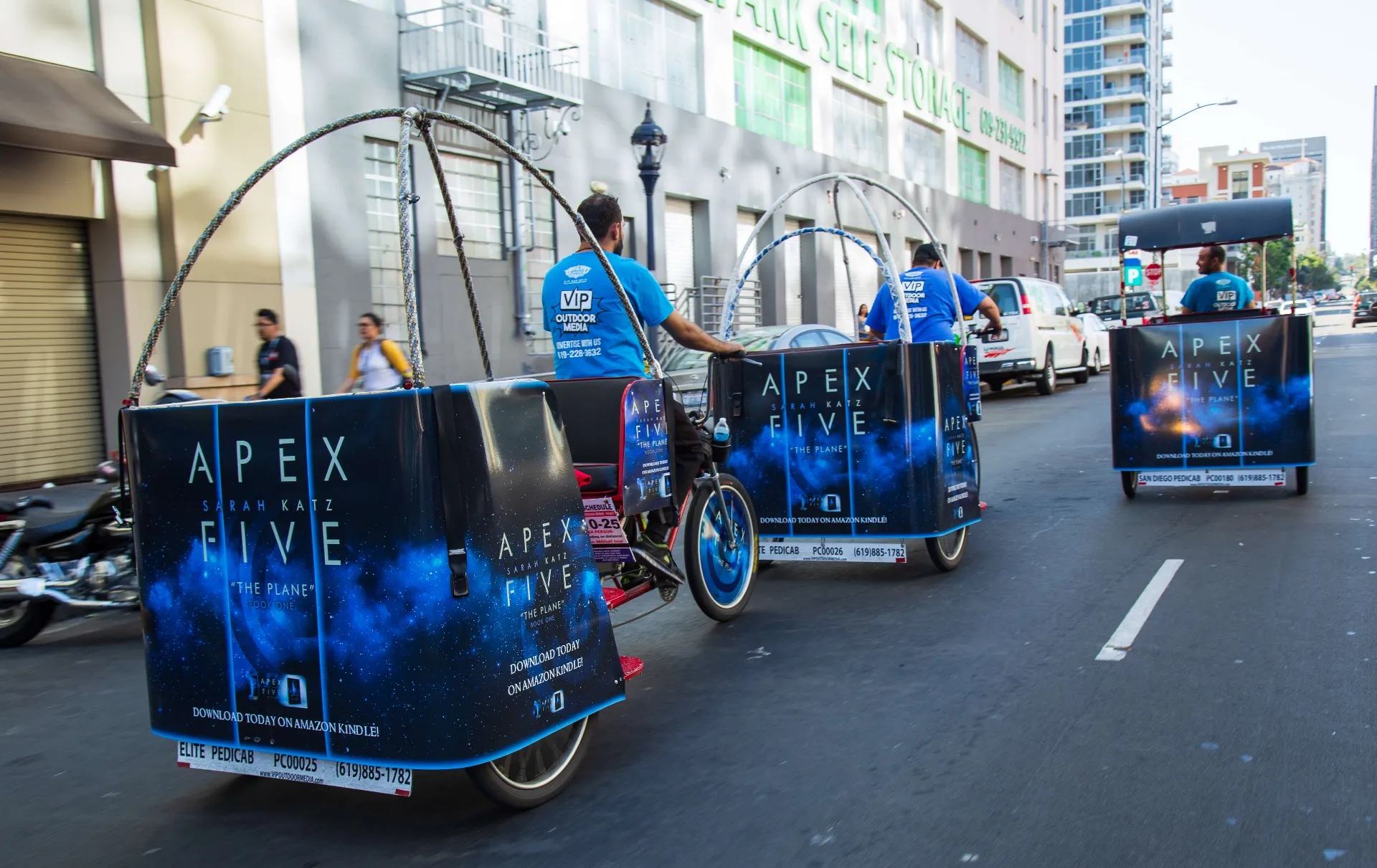 Apex Five campaign pedicab convoy moving through city streets