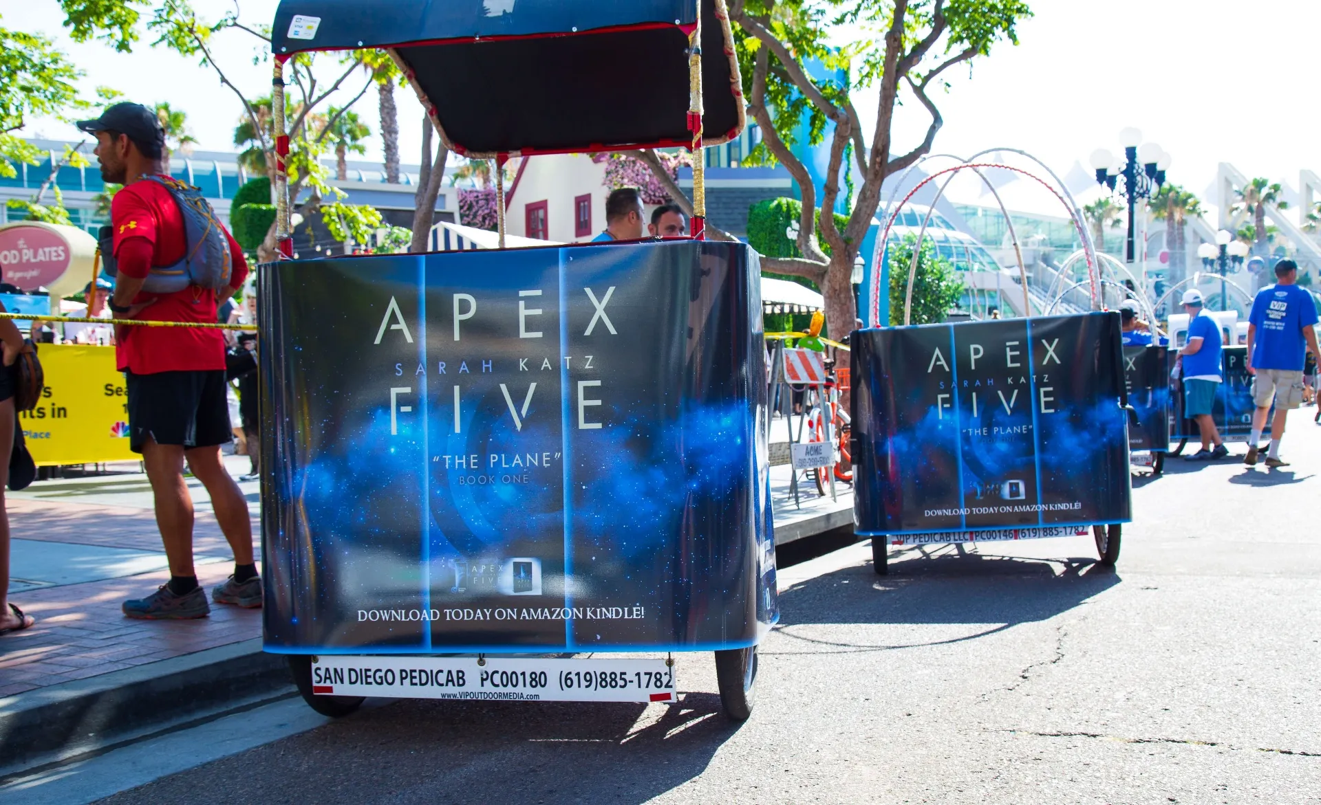 Apex Five by Sarah Katz branded pedicab close-up at Comic-Con
