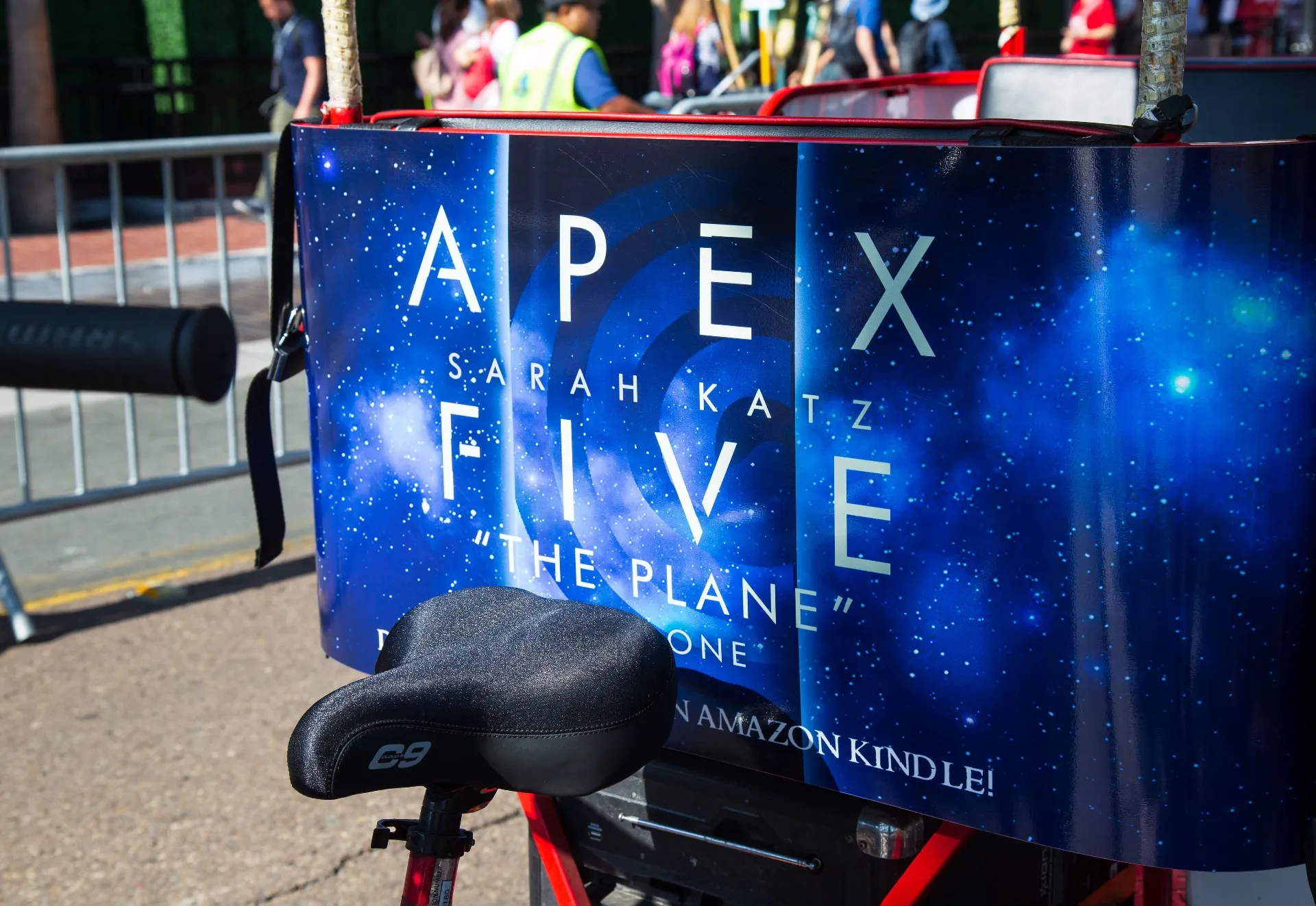 Apex Five book cover pedicab wrap detail at Comic-Con