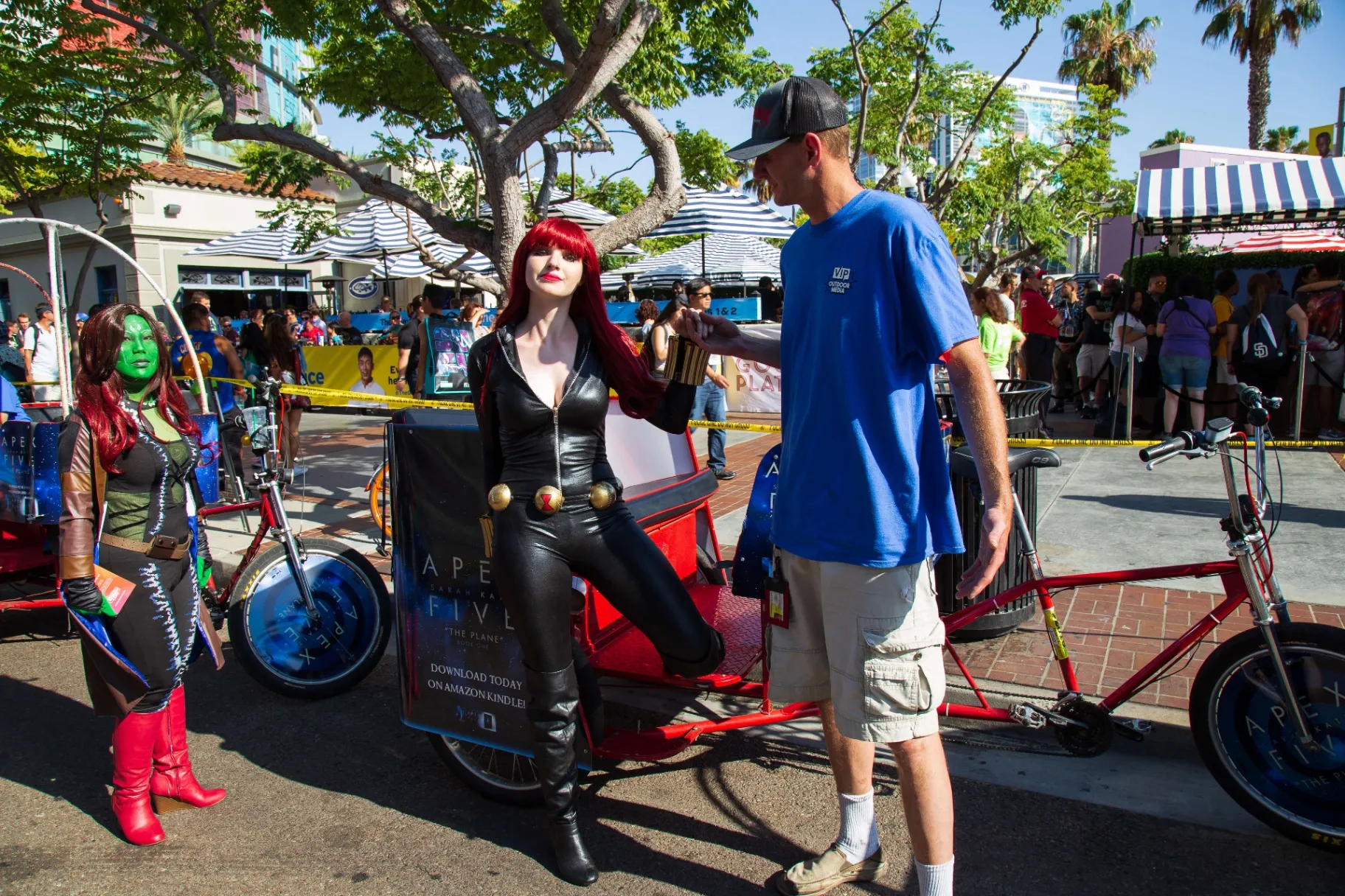 Apex campaign pedicab with Black Widow and Gamora cosplayers during Comic-Con activation