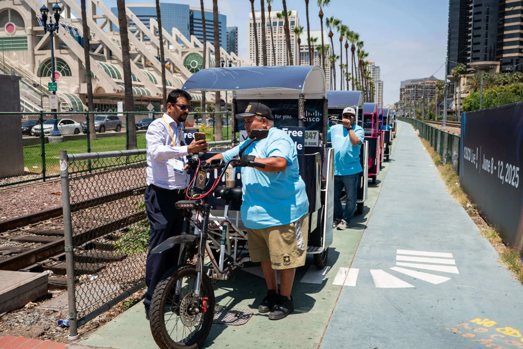 Cisco branded pedicab advertising fleet providing free rides in San Diego's Gaslamp Quarter