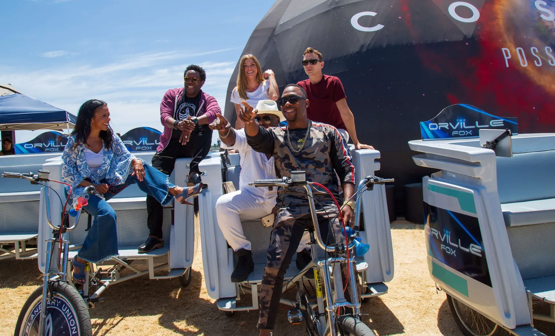 Orville pedicab group photo with campaign guests at COSMOS dome